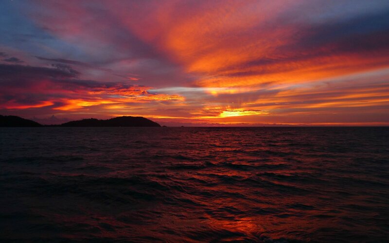 Sunset over Ocean — Red, Dramatic, Photograph, Sky, Island