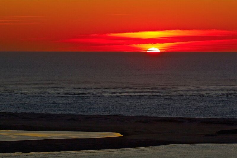 Sunset over Ocean — Red, Dramatic, Photograph, Sky, Sand