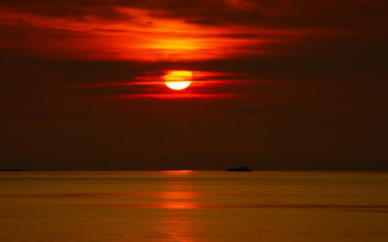 Sunset over Ocean — Red, Dramatic, Photograph, Sun, Boat
