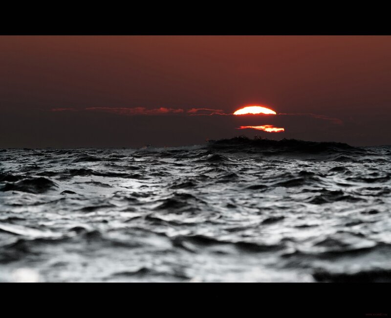 Sunset over Ocean — Red, Dramatic, Photograph, Sun, Clouds, Waves, Black