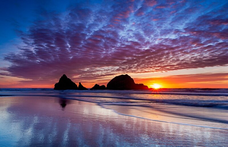 Sunset over Ocean Rocks — Blue, Dramatic, Photograph
