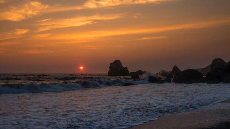Sunset over Ocean Rocks — Orange, Serene, Photograph, Sun