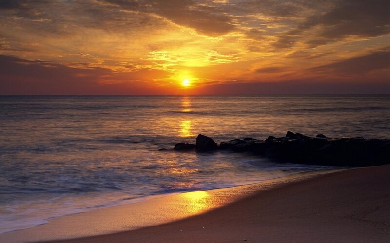 Sunset over Ocean — Serene, Rocks