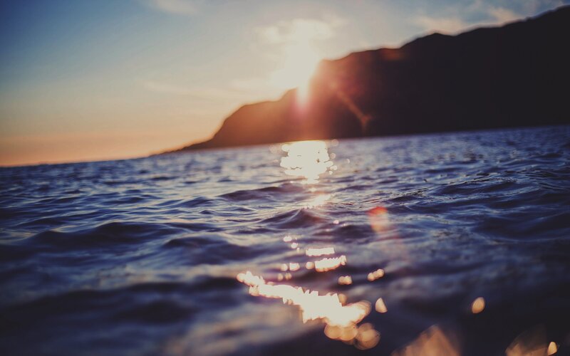 Sunset over Ocean Water
