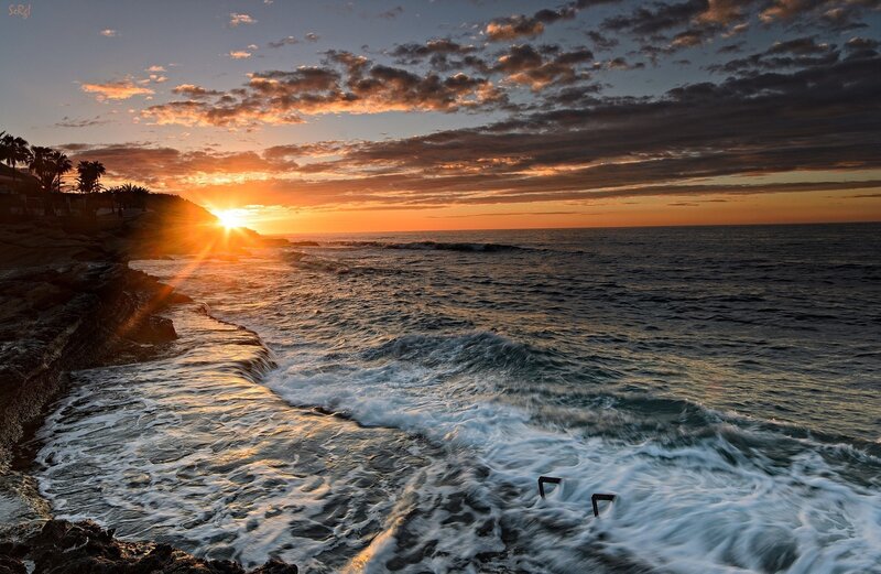 Sunset over Ocean Waves — Orange, Dramatic, Photograph, Cliff, Palm Trees