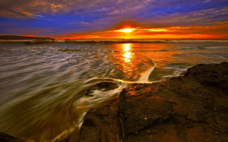 Sunset over Ocean Waves — Orange, Dramatic, Photograph, Rocks