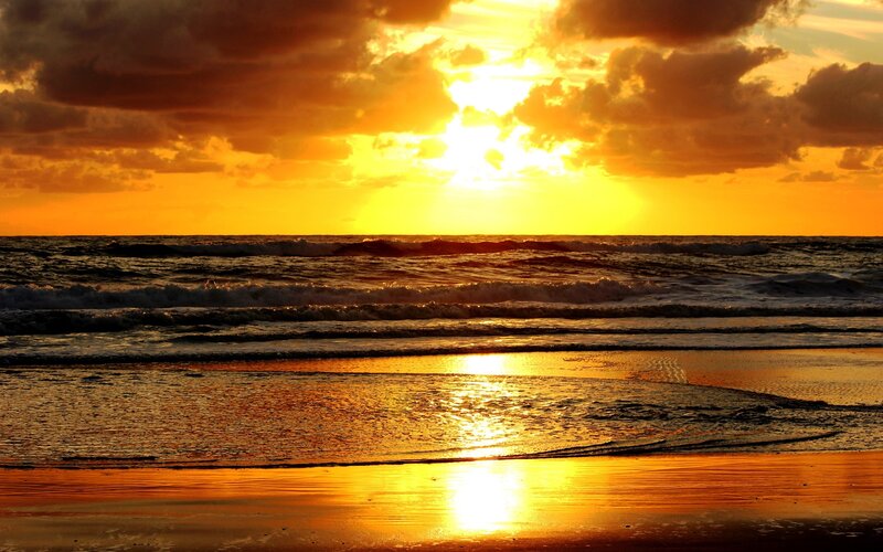 Sunset over Ocean Waves — Orange, Dramatic, Photograph, Sand, Clouds, Yellow