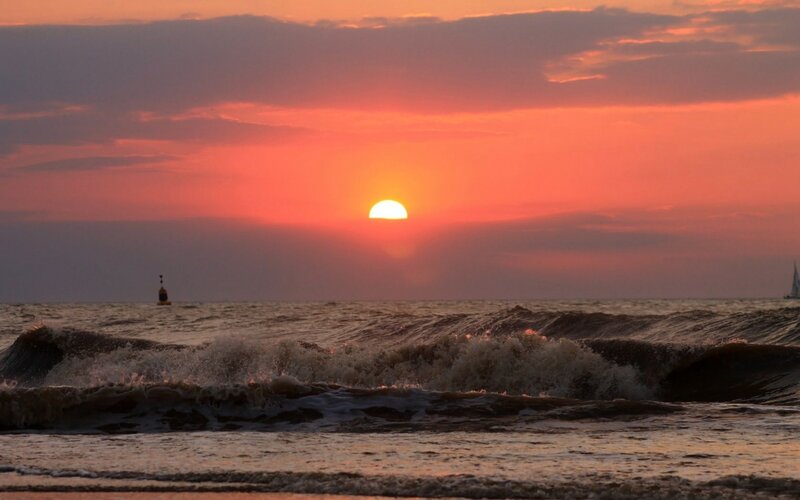 Sunset over Ocean Waves — Orange, Dramatic, Photograph, Sun, Buoy