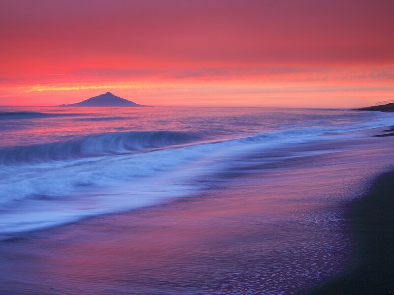 Sunset over Ocean Waves — Red, Serene, Photograph, Island