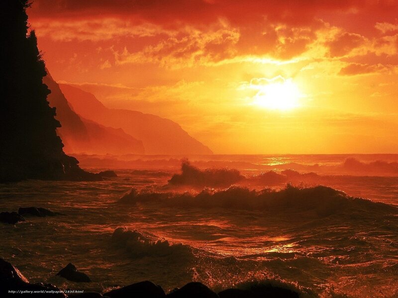 Sunset over ocean waves
