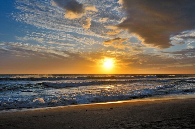 Sunset over Ocean Waves — Yellow, Serene, Photograph, Sky, Sand