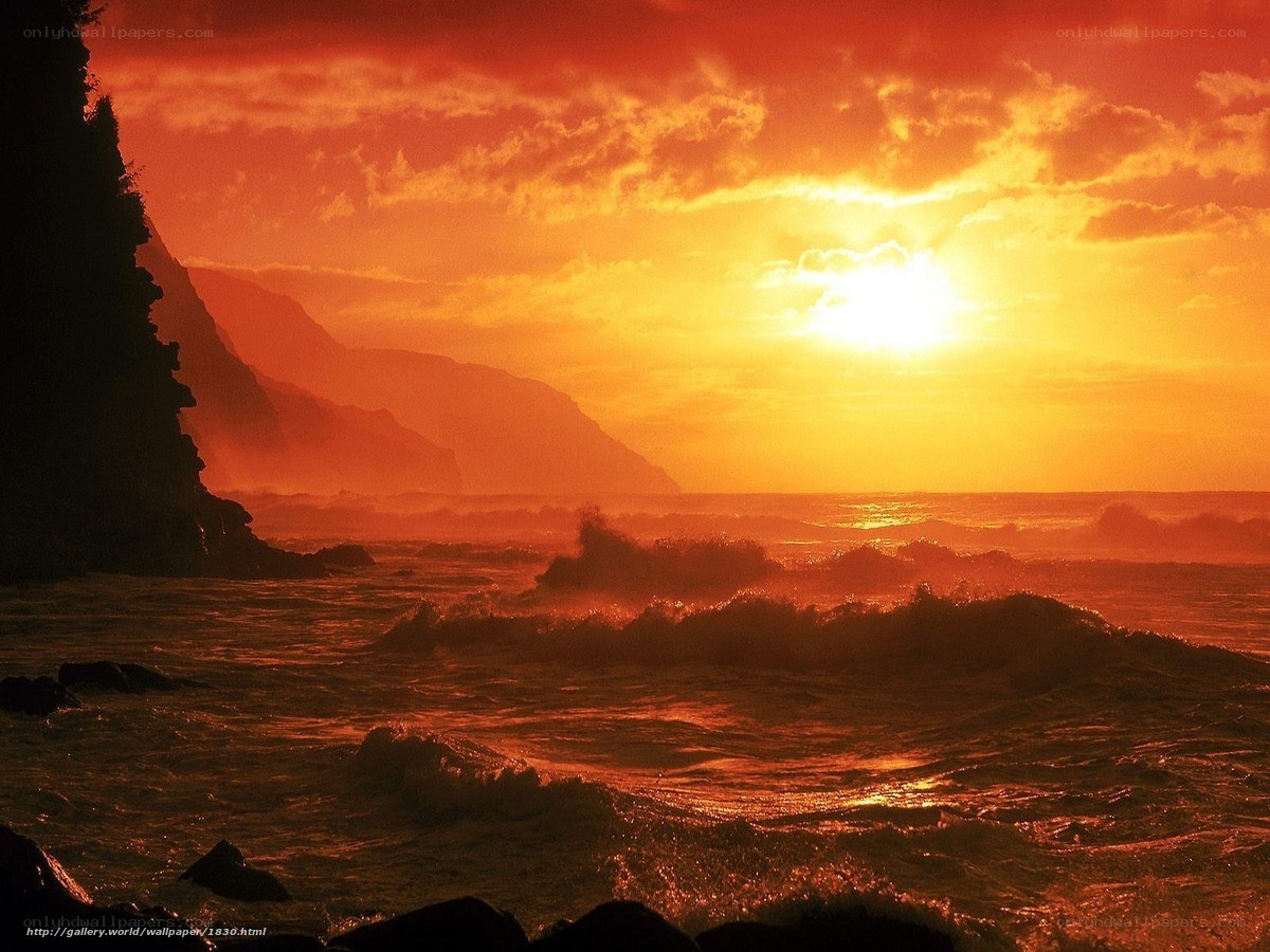 Sunset over ocean waves