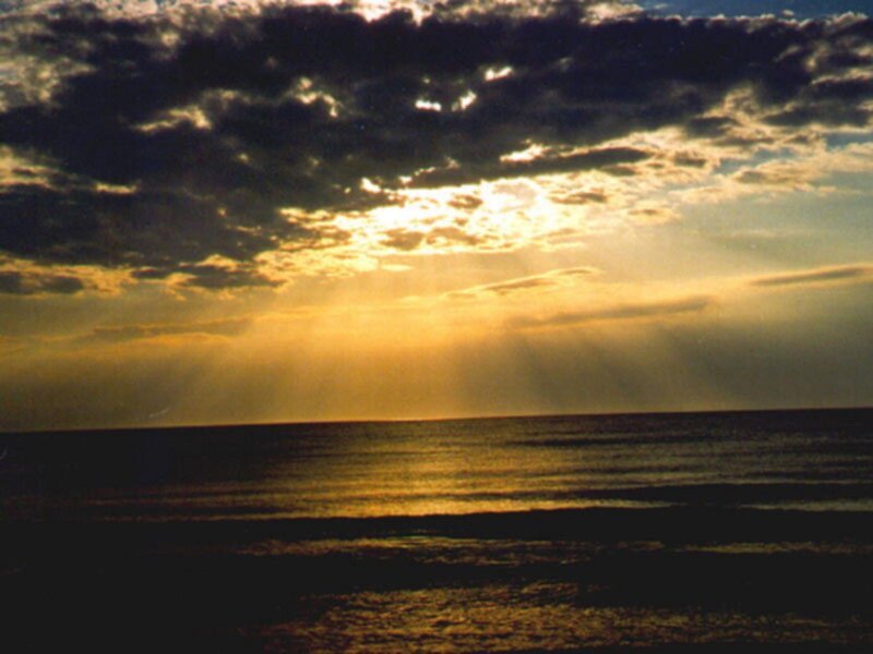Sunset over Ocean — Yellow, Dramatic, Photograph