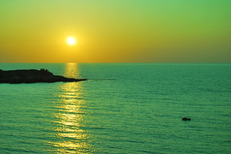 Sunset over Ocean — Yellow, Serene, Photograph, Boat