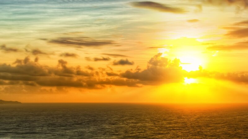 Sunset over Ocean — Yellow, Serene, Photograph, Clouds, Sun