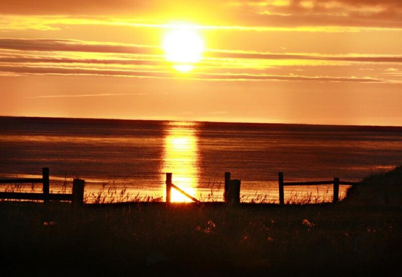 Sunset over Ocean — Yellow, Serene, Photograph, Fence