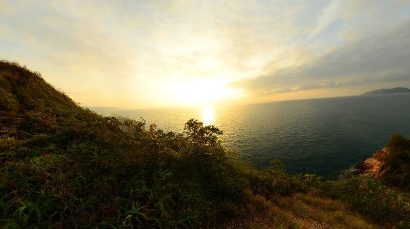 Sunset over Ocean — Yellow, Serene, Photograph, Hill