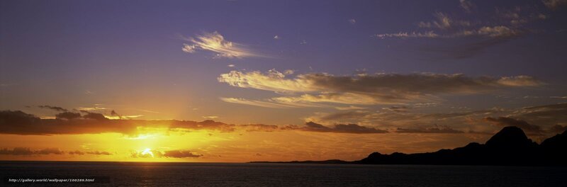 Sunset over Ocean — Yellow, Serene, Photograph, Mountains, Clouds
