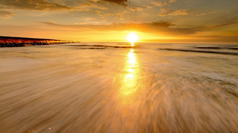 Sunset over Ocean — Yellow, Serene, Photograph, Sun, Beach, Cliffs