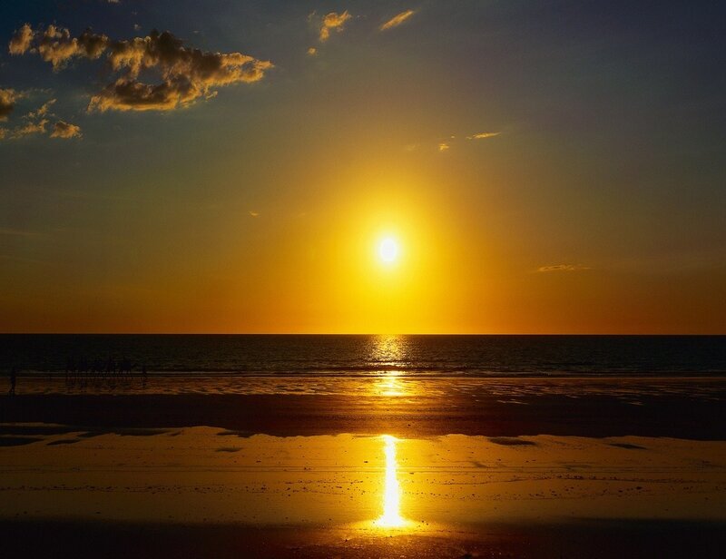 Sunset over Ocean — Yellow, Serene, Photograph, Sun, Clouds