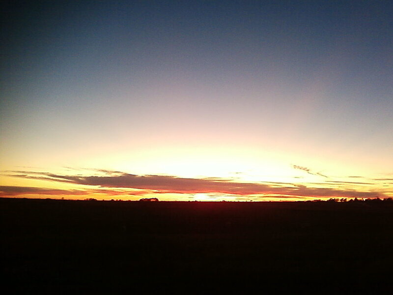 sunset over open fields
