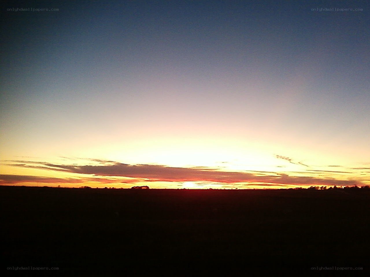 sunset over open fields
