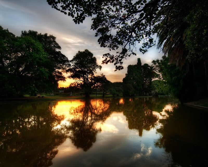 Sunset over park pond