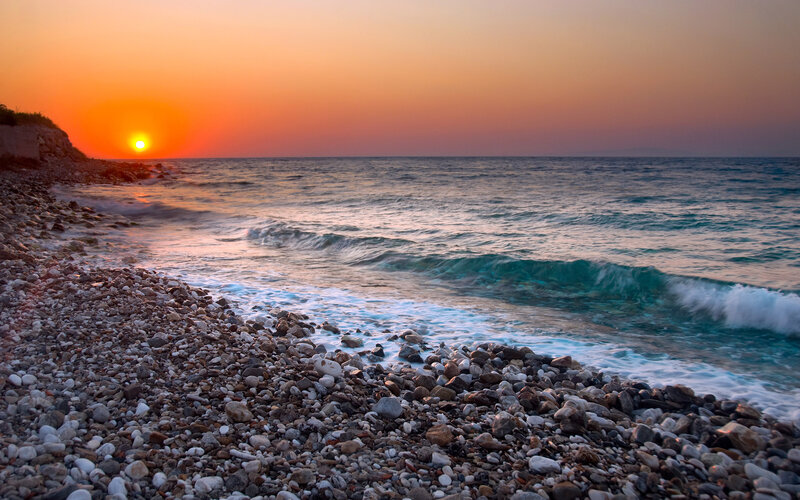 Sunset over Pebble Beach — Orange, Serene, Photograph, Ocean