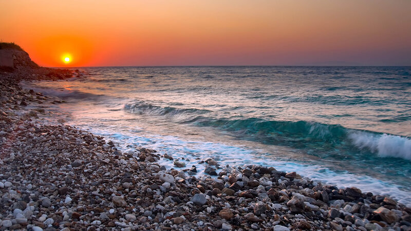 Sunset over Pebble Beach — Orange, Serene, Photograph, Ocean, Waves, Sky