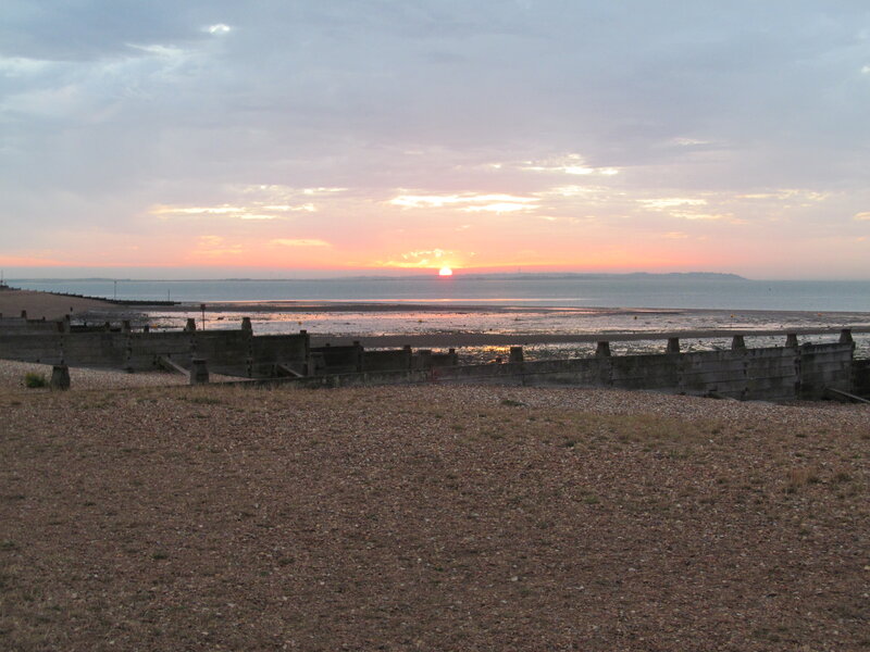 Sunset over Pebble Beach — Orange, Serene, Photograph, Sea