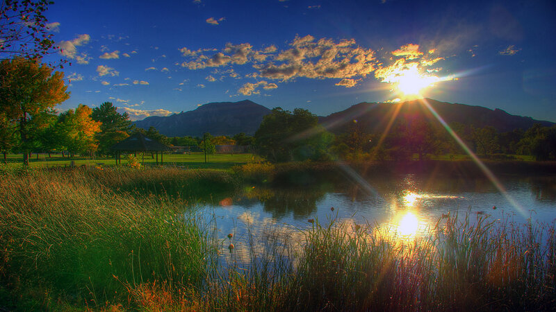 Sunset over Pond and Mountains