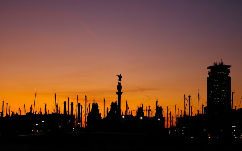 sunset over port silhouette