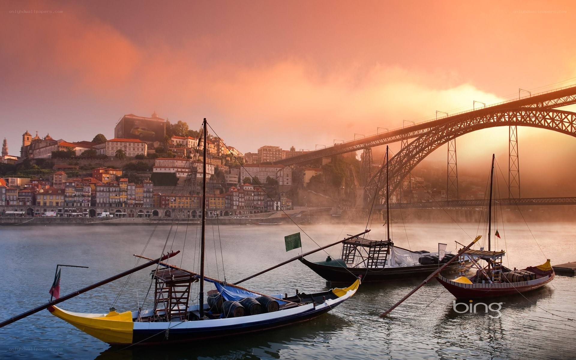 Sunset over Porto with boats