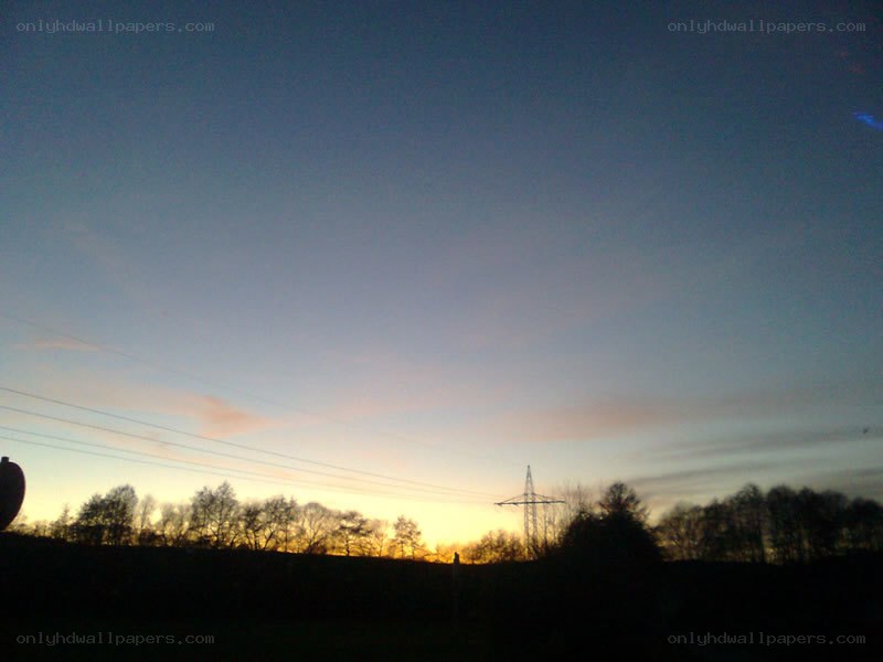 sunset over power lines