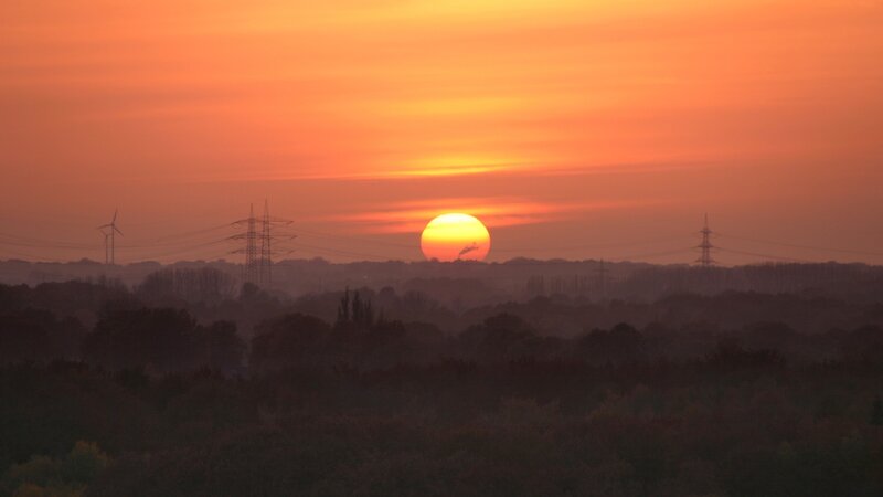 Sunset over power lines