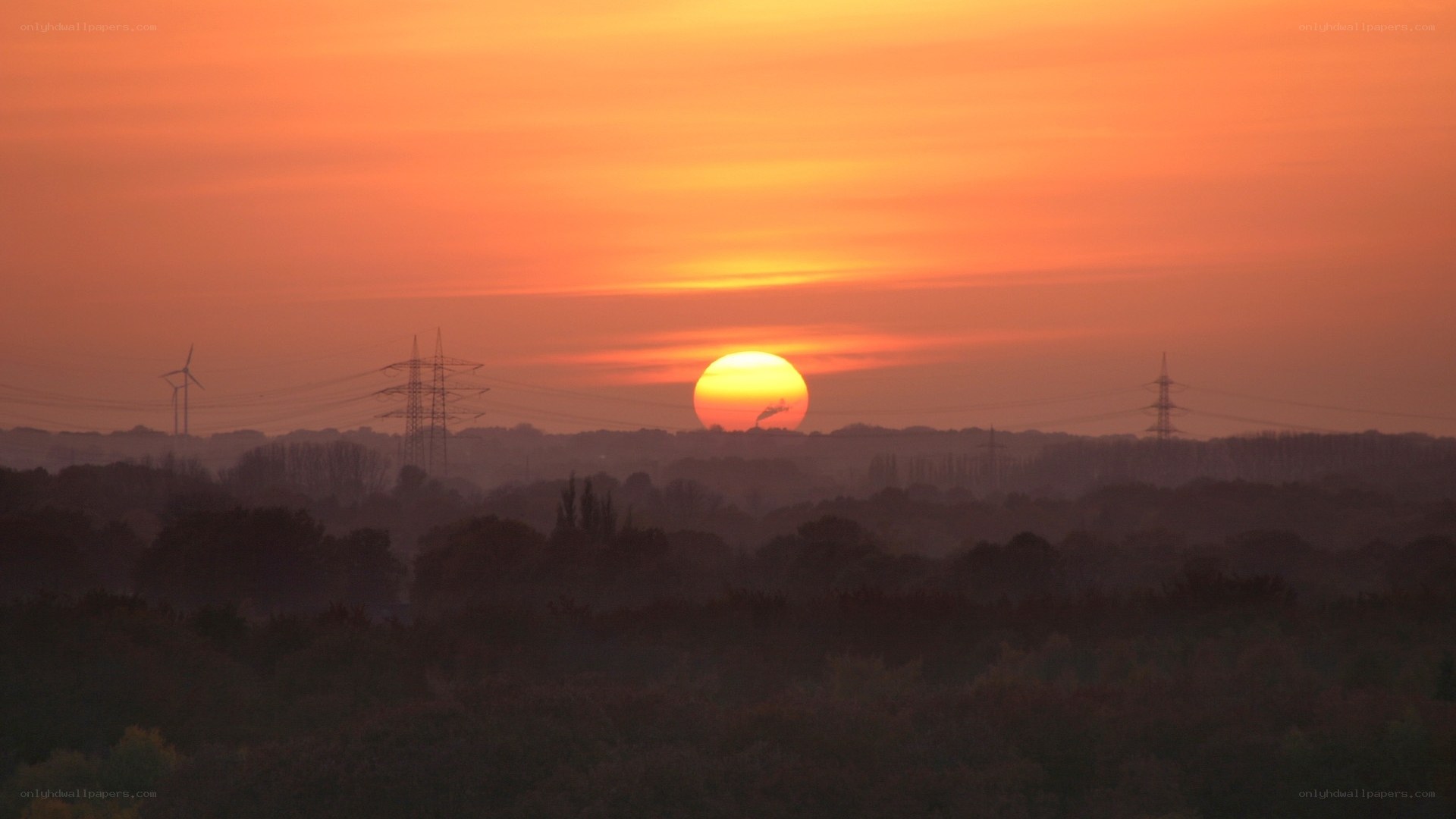 Sunset over power lines