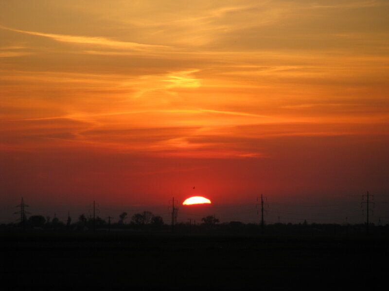 Sunset over Power Lines — Orange, Dramatic, Photograph, Sun, Power Lines, Clouds