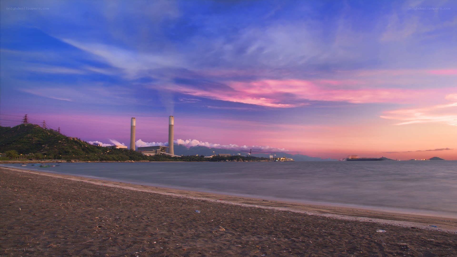 sunset over power plant