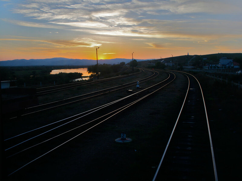 Sunset over railway tracks