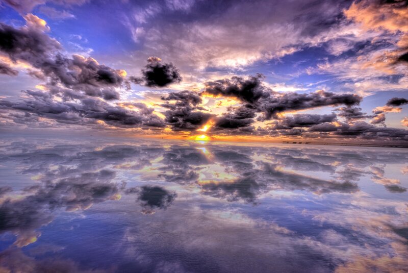 Sunset over Reflective Water — Blue