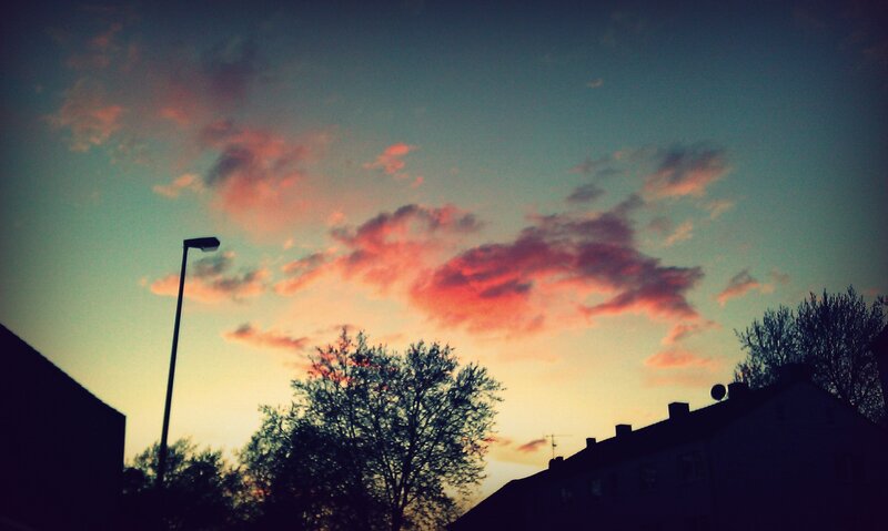 sunset over residential buildings