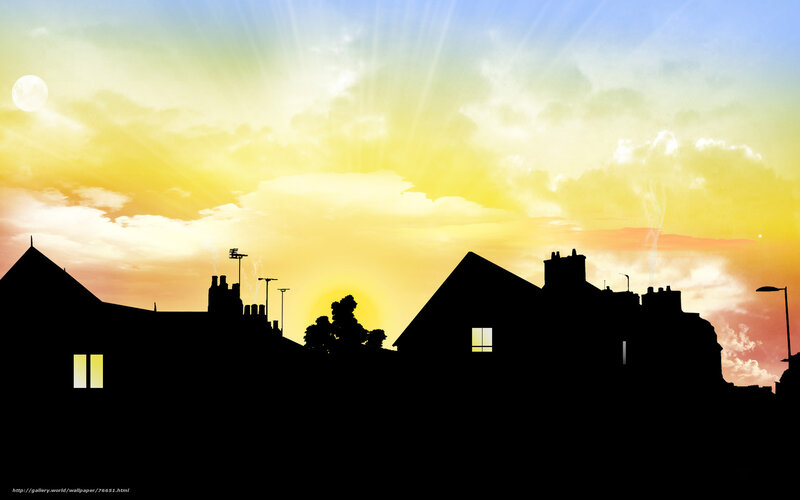 sunset over residential rooftops