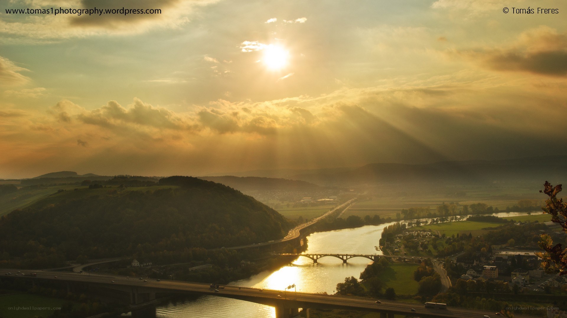 Sunset over river and bridges