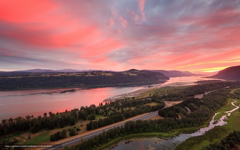 Sunset over river and hills