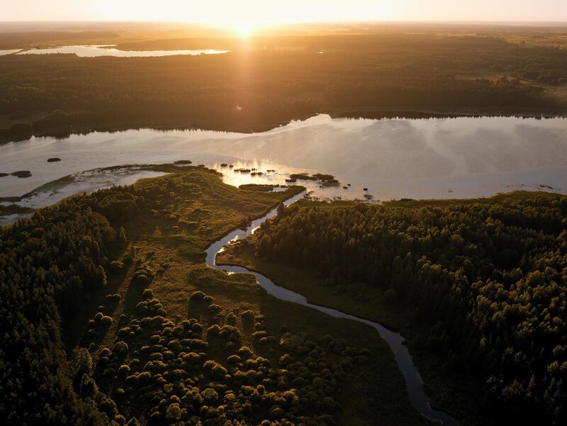 Sunset over river and lake