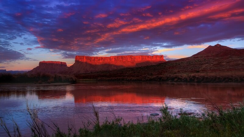 Sunset over river and mesas