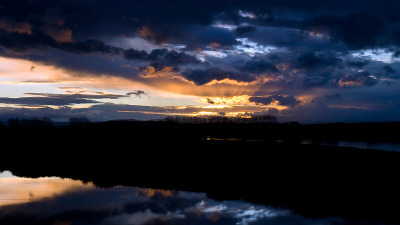 Sunset over River — Blue, Dramatic, Photograph, Clouds, Trees
