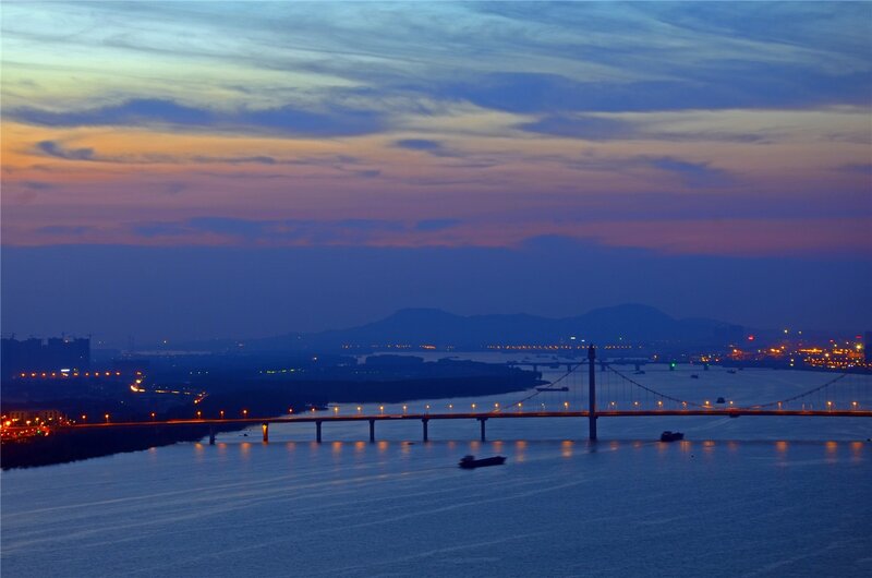 Sunset over River Bridge — Blue, Serene, Photograph, City Lights