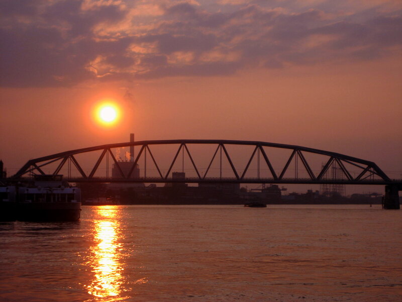 Sunset over River Bridge — Orange, Dramatic, Photograph