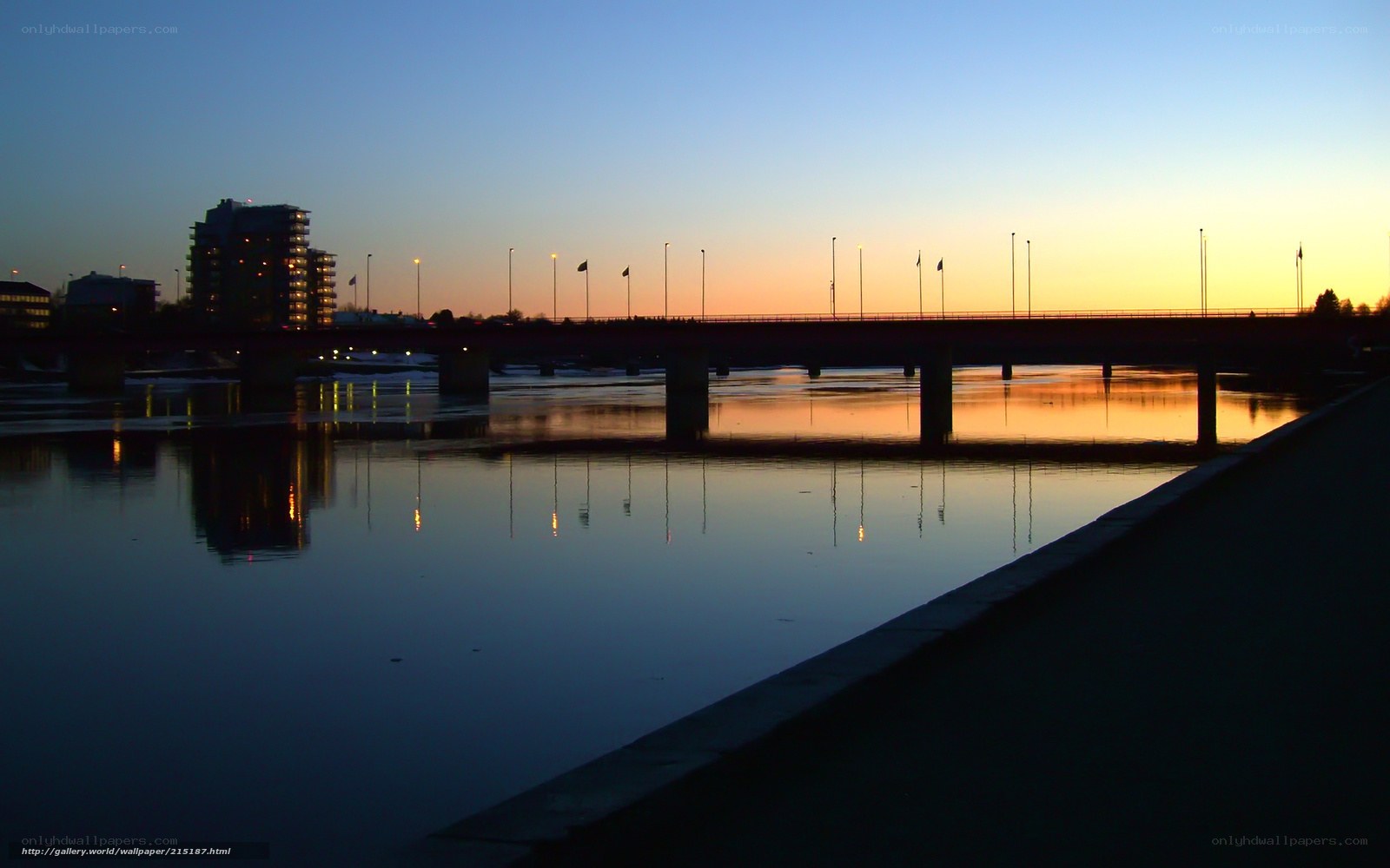 sunset over river bridge